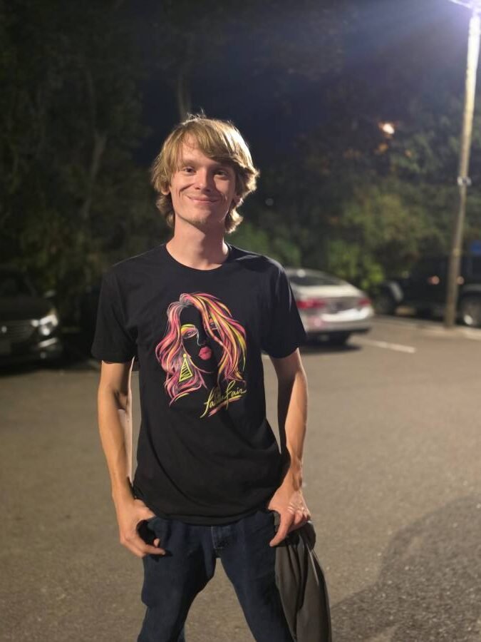 Logan Work wearing t-shirt
